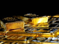 الذهب يهبط ويحوم فوق 1800 دولار